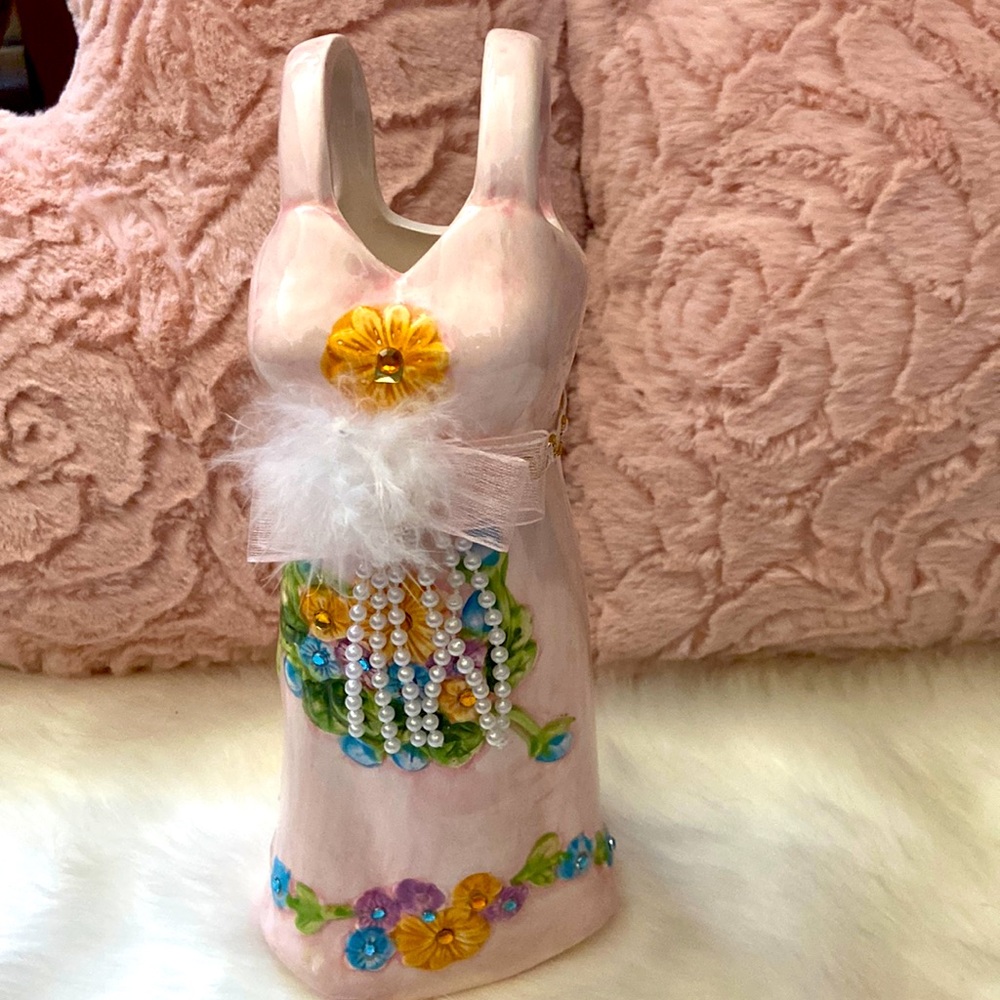 Ceramic Victorian dress decor.
